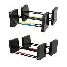 A pair of black powerblock expansion sport weight lifting handles with yellow, red, and blue straps.